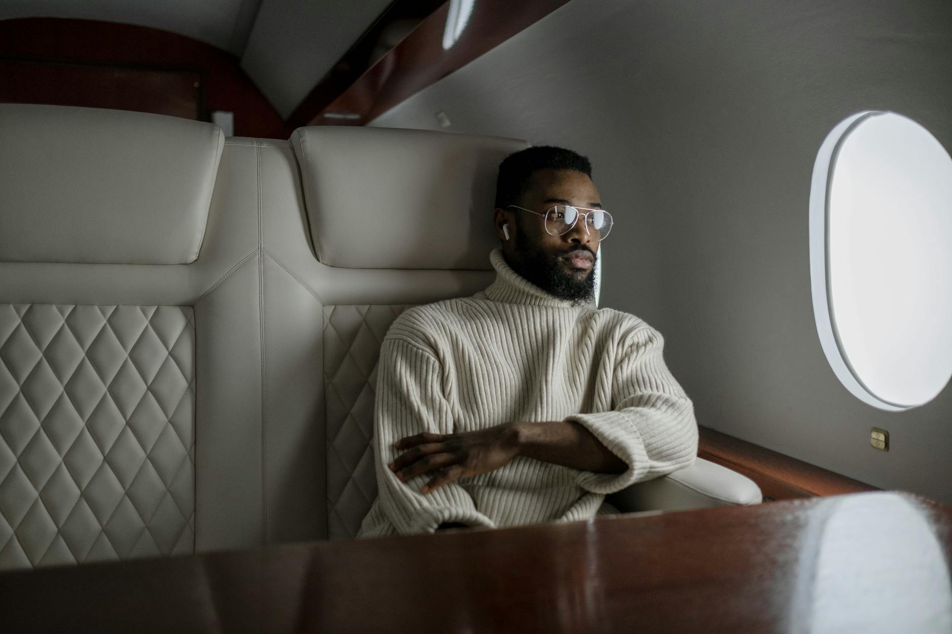 Luxurious airplane cabin interior showing premium seating arrangements