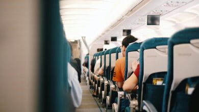 Interior view of commercial airplane cabin with passenger seats