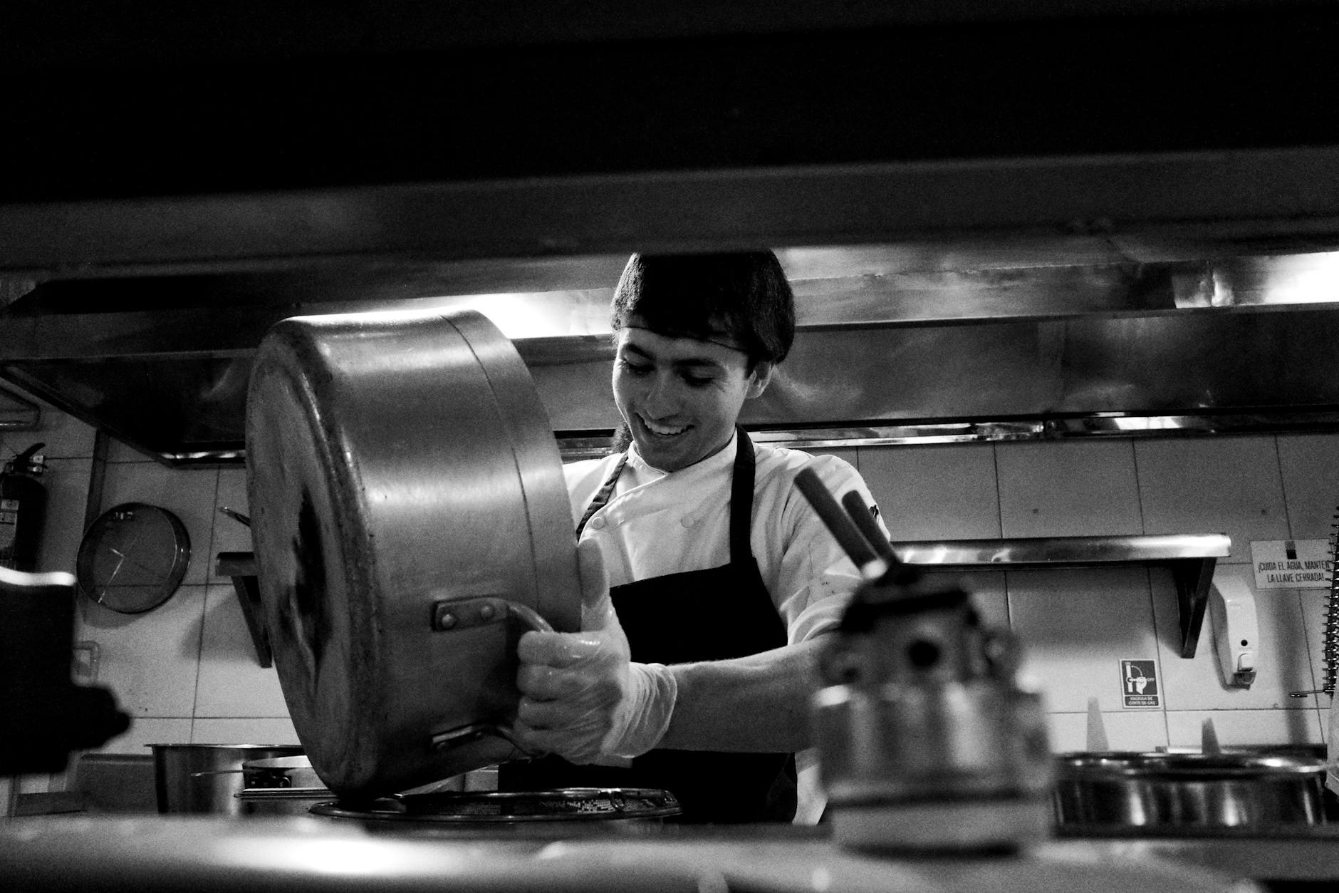 Professional chef preparing fresh ingredients in modern kitchen
