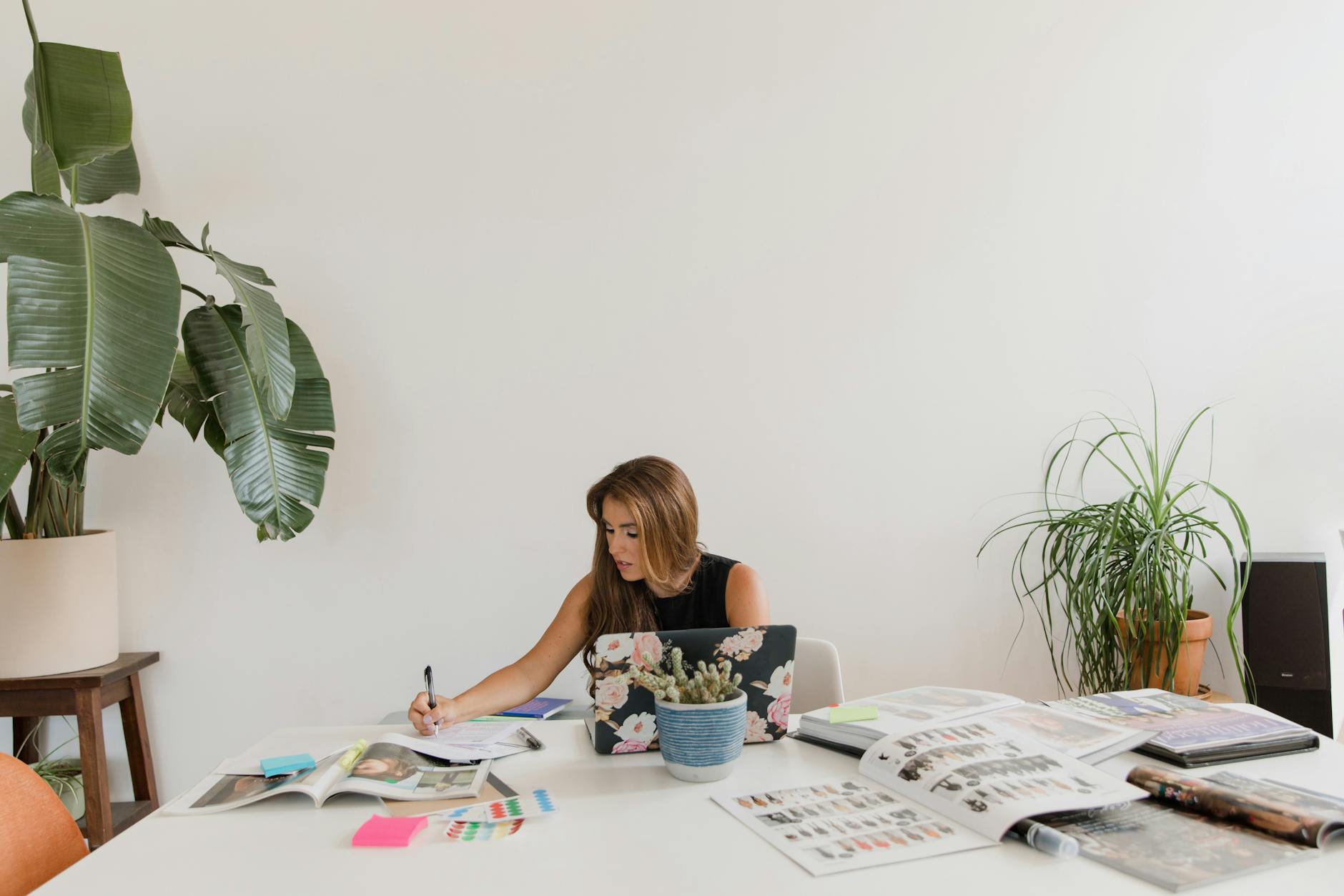 Interior designer consulting with client about office space layout and furniture placement