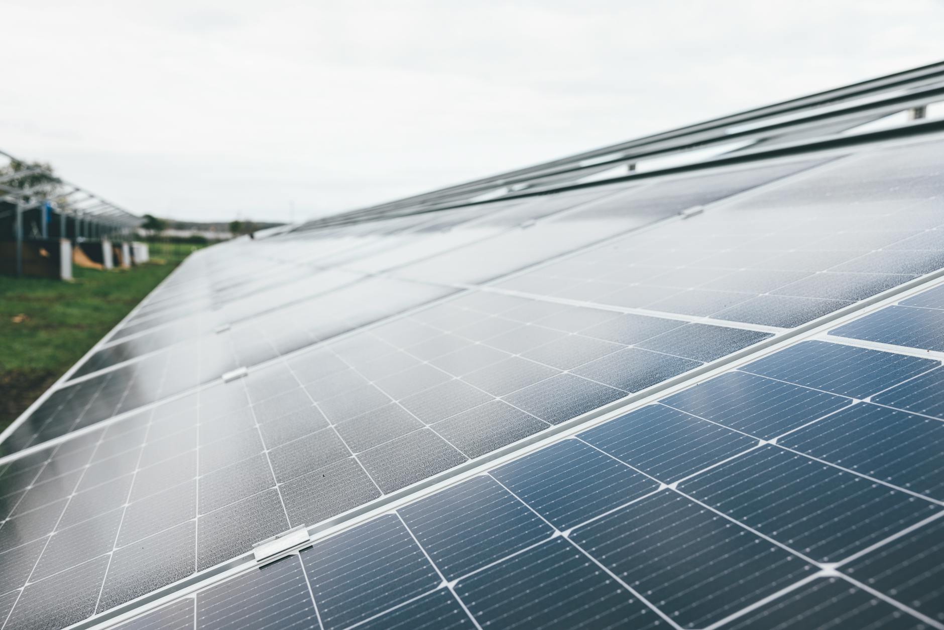 Solar panel installation on resort building roof generating renewable energy