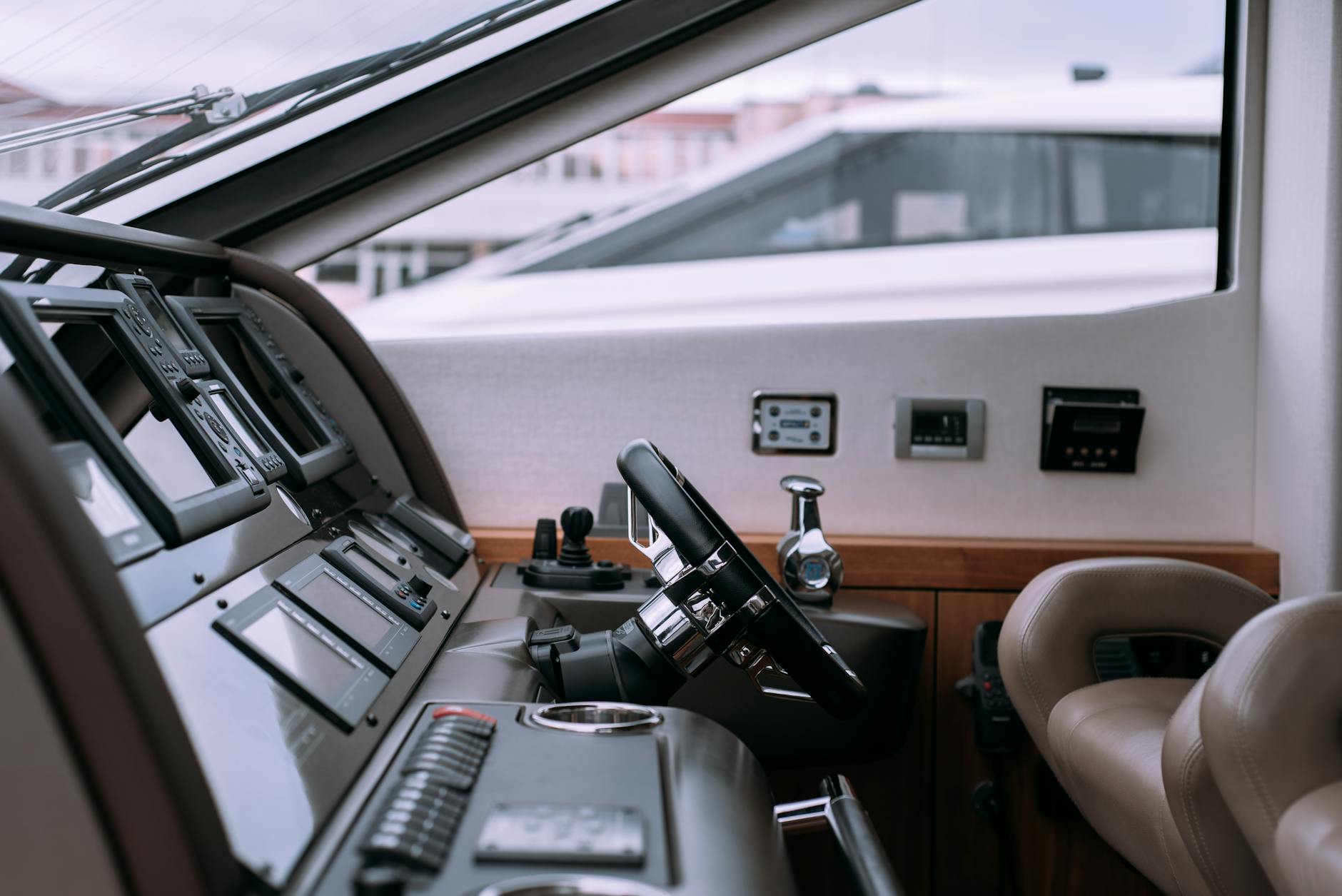 Elegant boat cabin interior with panoramic windows and premium furnishings