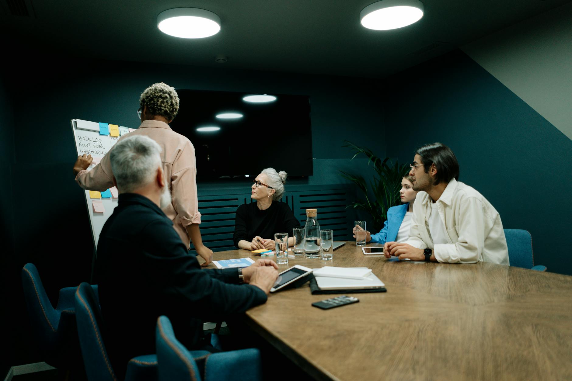Executive boardroom with sophisticated lighting system and conference table