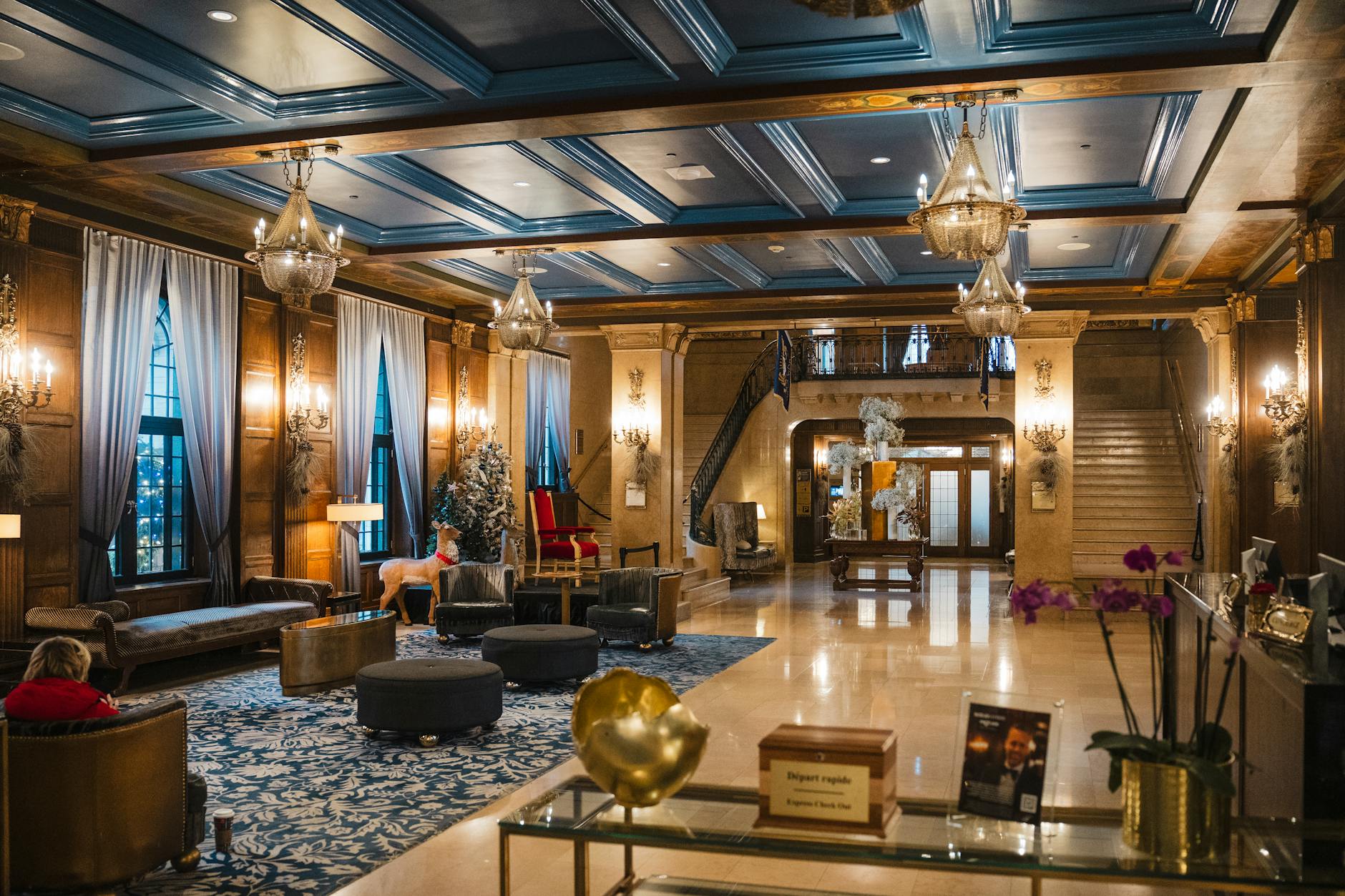 Modern hotel lobby interior with comfortable seating and reception desk