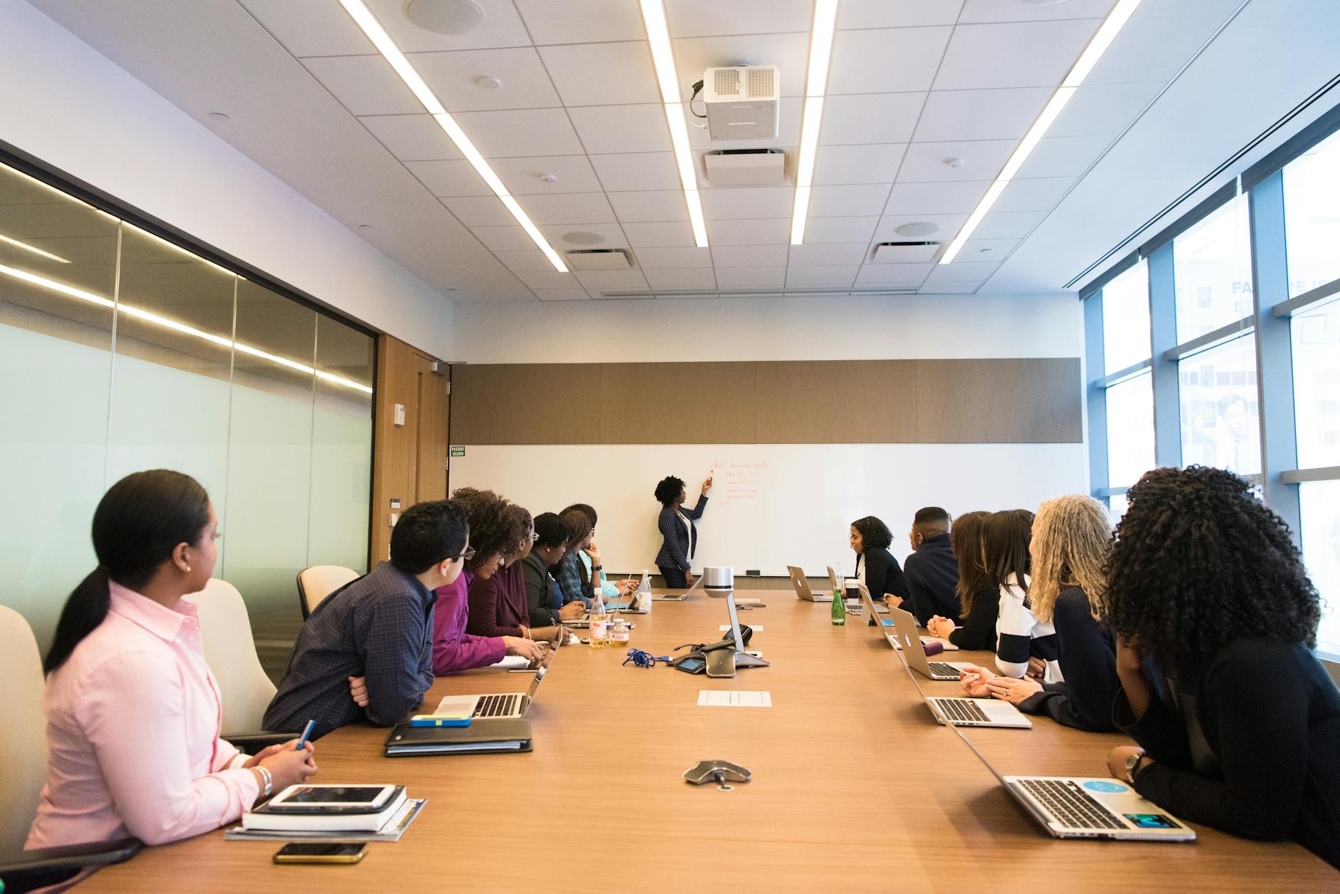 Professional meeting room setup with modern technology and collaborative workspace design
