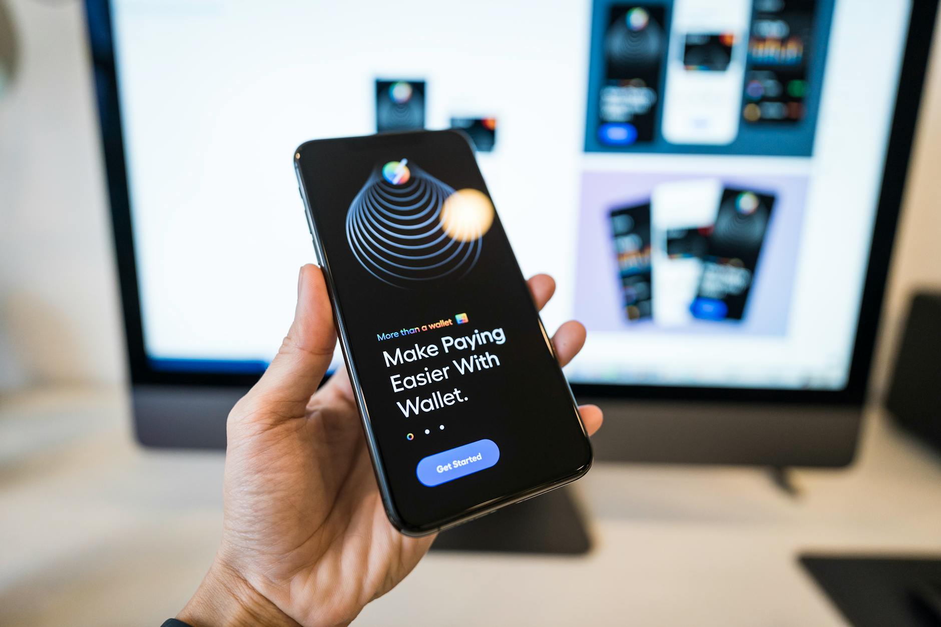Person using smartphone to check banking app with credit card rewards information on screen
