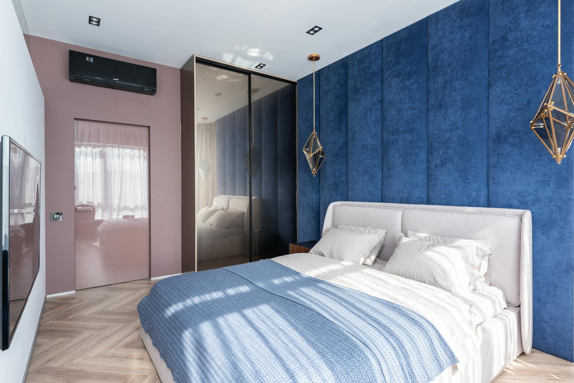 Comfortable hotel room with neatly made bed and warm lighting