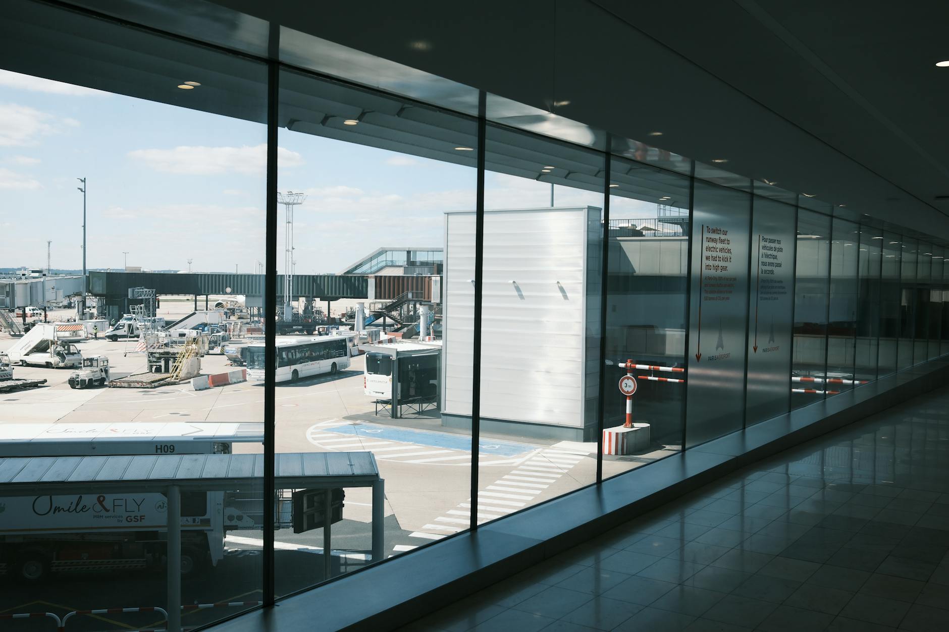 Busy airport terminal with travelers and departure gates
