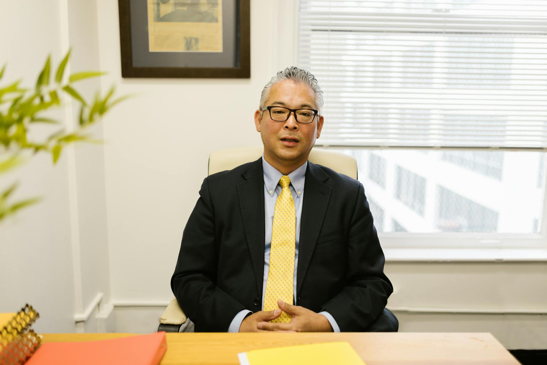 Confident business executive in professional attire looking thoughtful and composed
