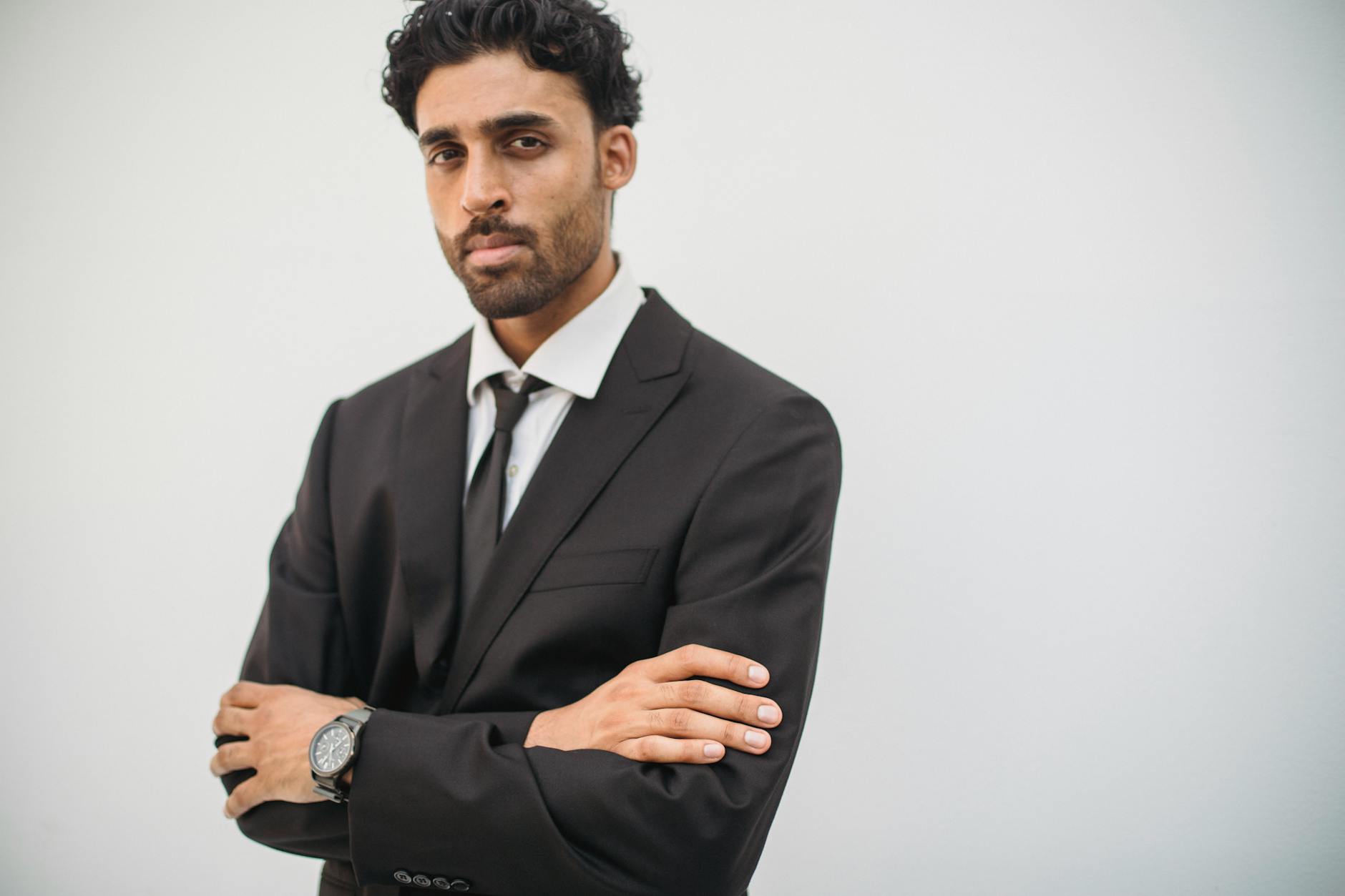 Professional business executive in formal attire looking confident