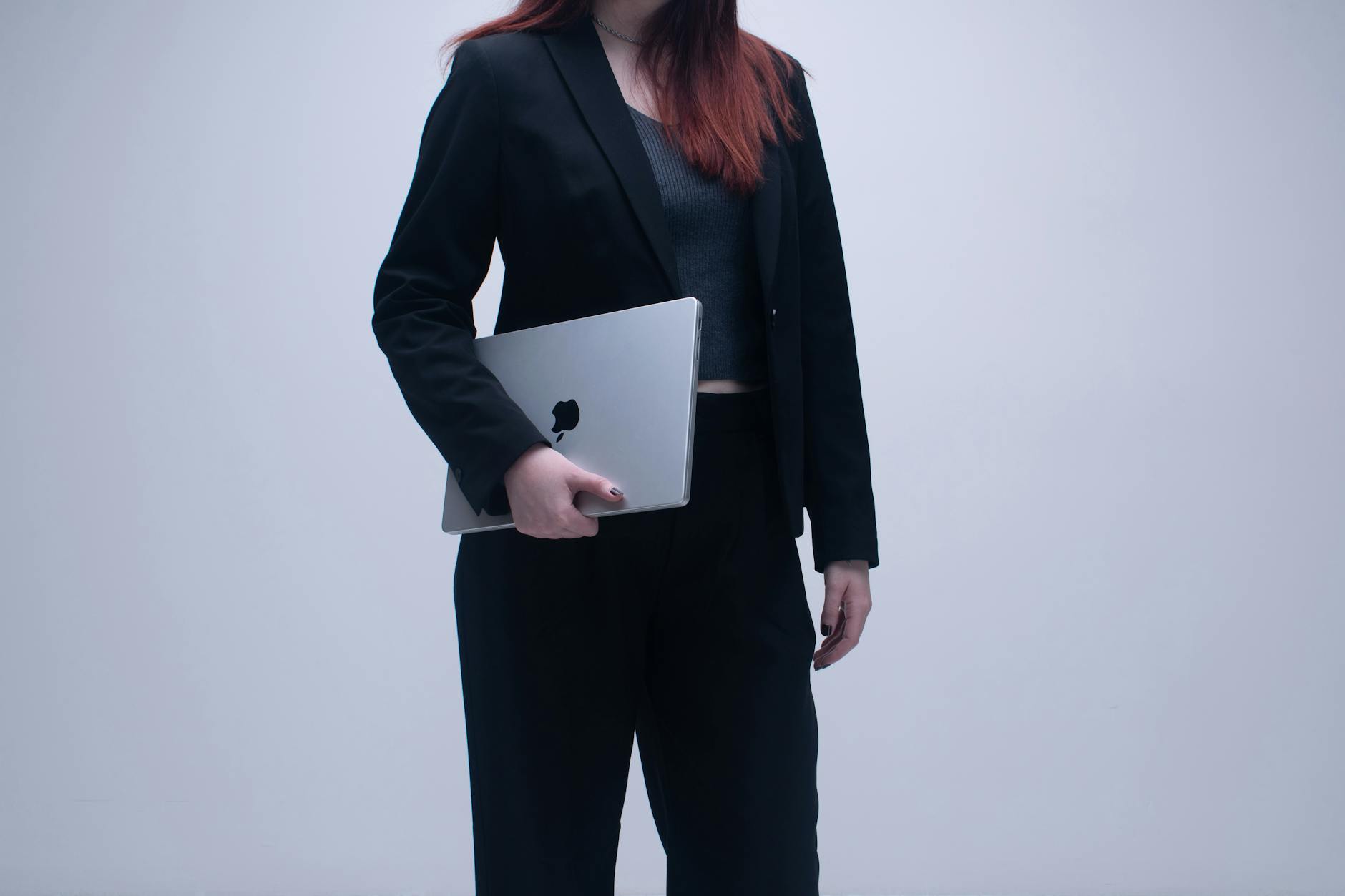 High-quality minimalist business attire laid out showing coordinated professional wardrobe pieces