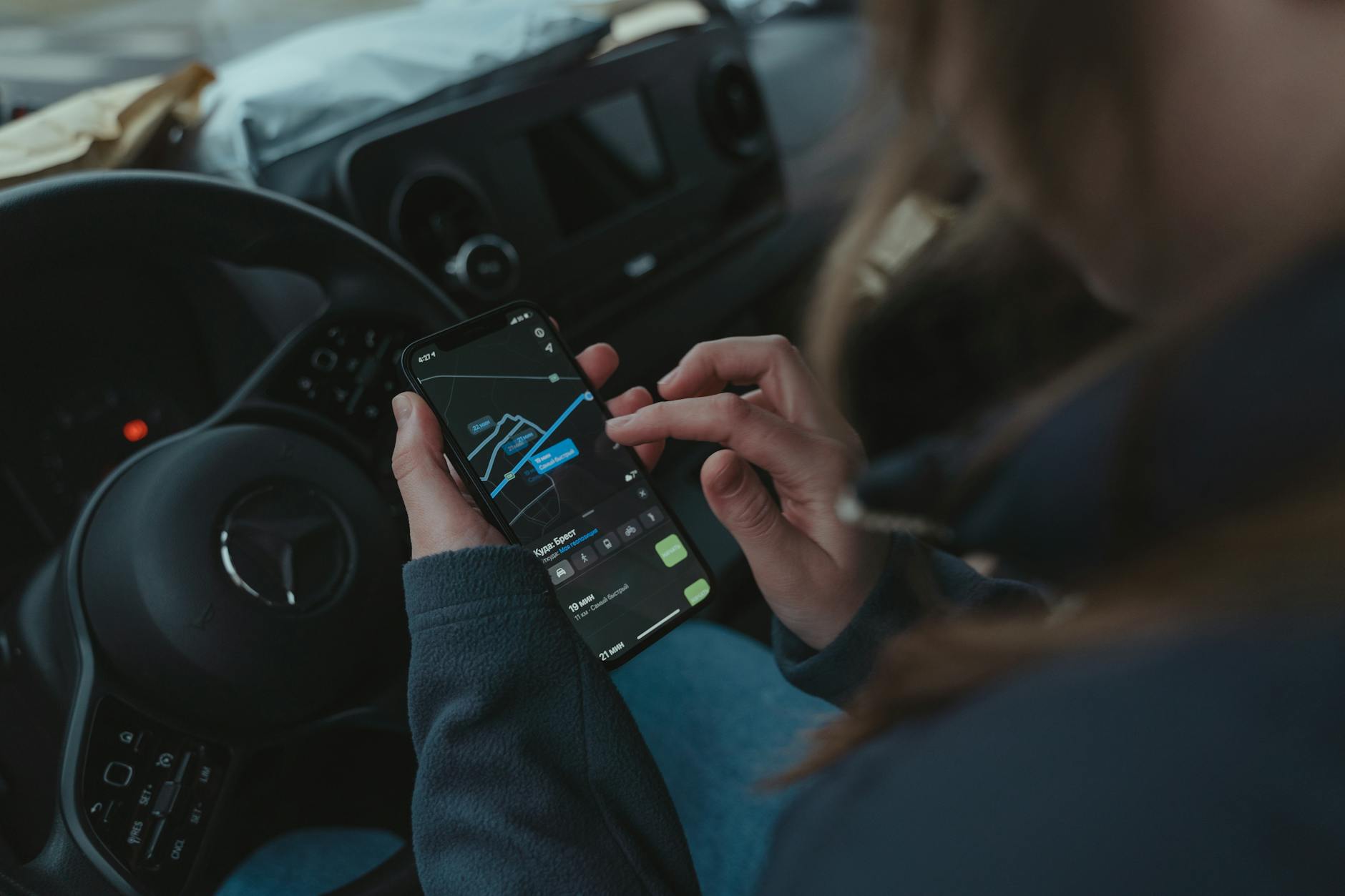 Traveler using smartphone for navigation and travel apps