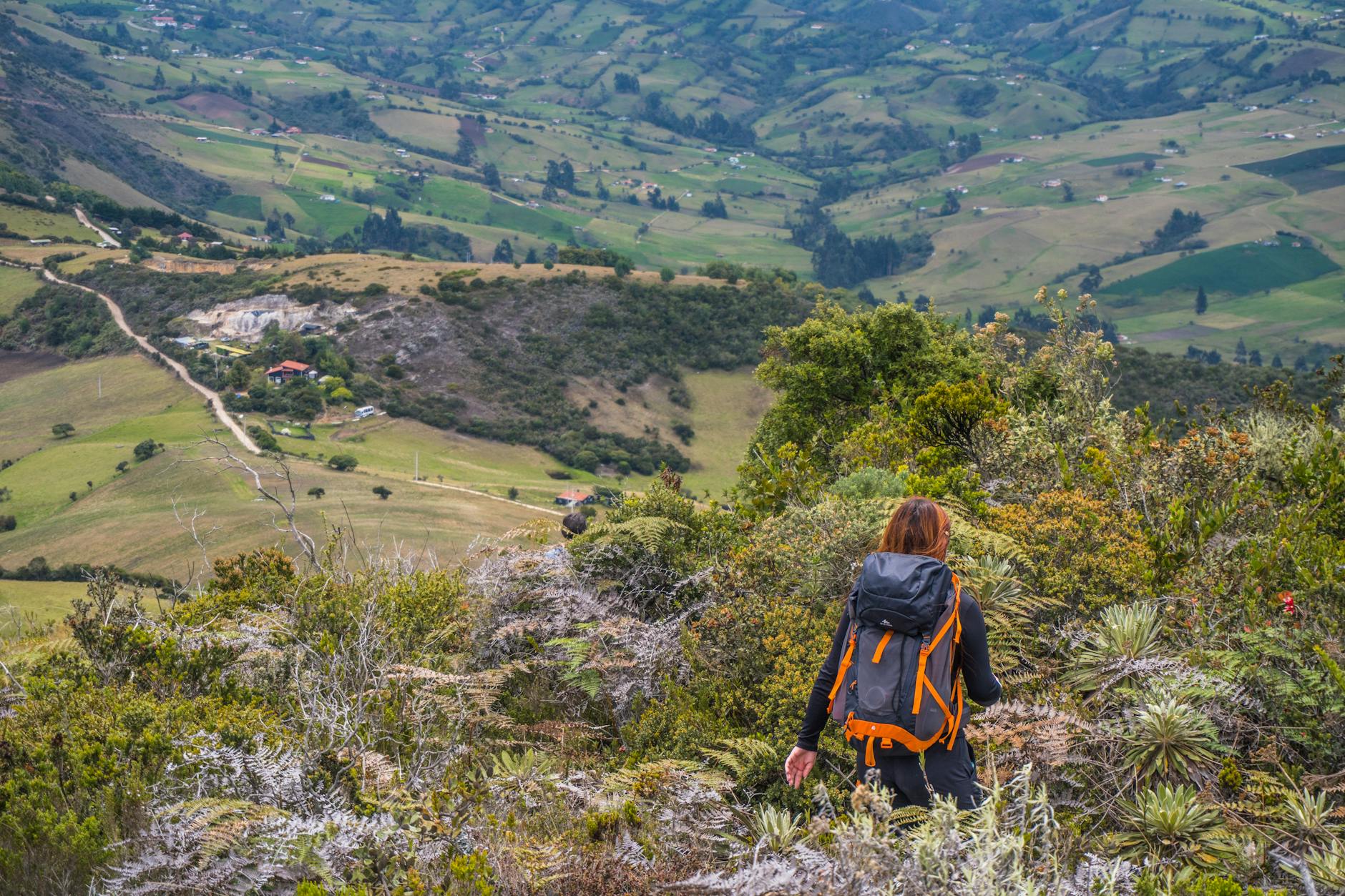 Solo female traveler with properly packed backpack ready for Southeast Asian adventure