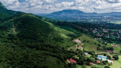 Misty highland village in the Usambara Mountains of Tanzania surrounded by green hills